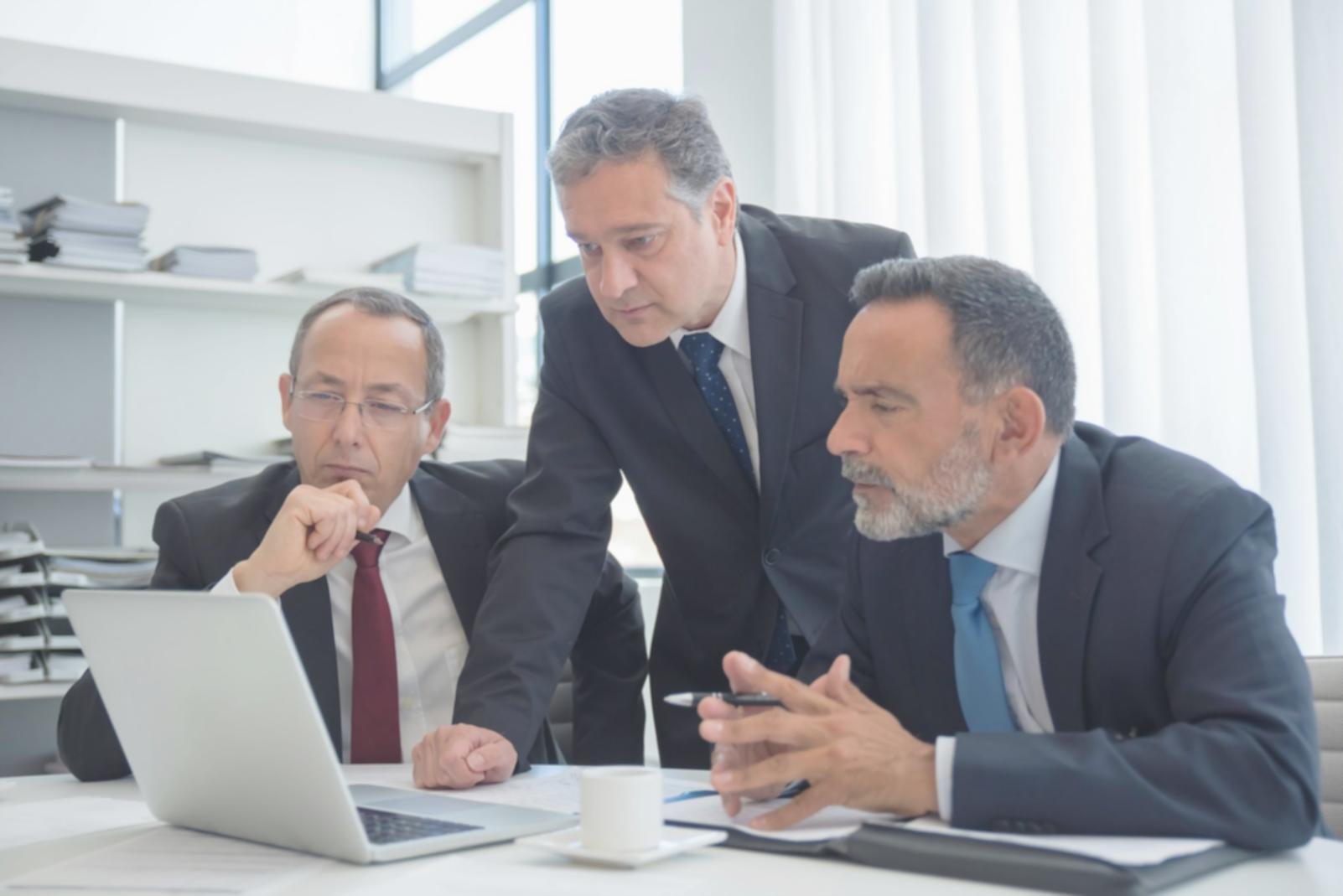 Professional retirement planning consultation session in modern office